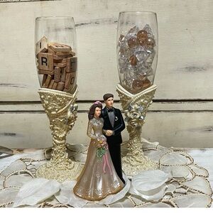 Elegant Wedding Champagne Flutes and Bride and groom figurine decoration stage